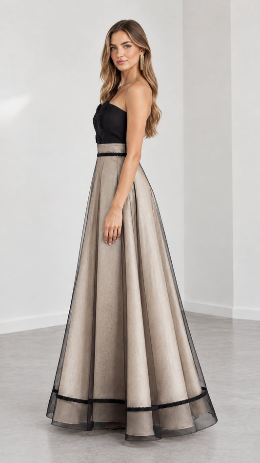 Side view of model in Champagne strapless floor-length formal dress