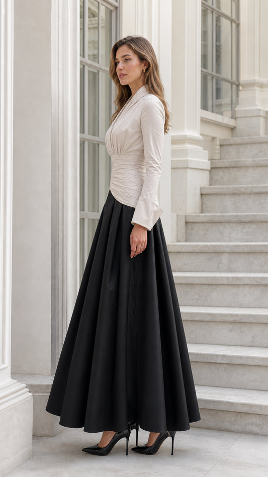 Side profile of beige and black two-tone ruched maxi dress