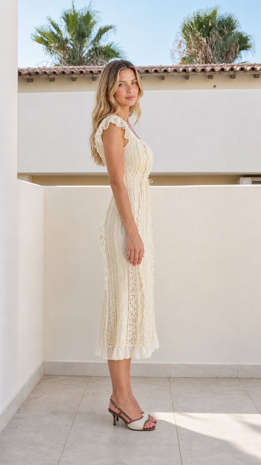 Side profile view of ivory midi dress