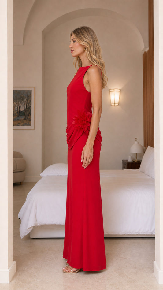 Side profile of model in red formal maxi dress