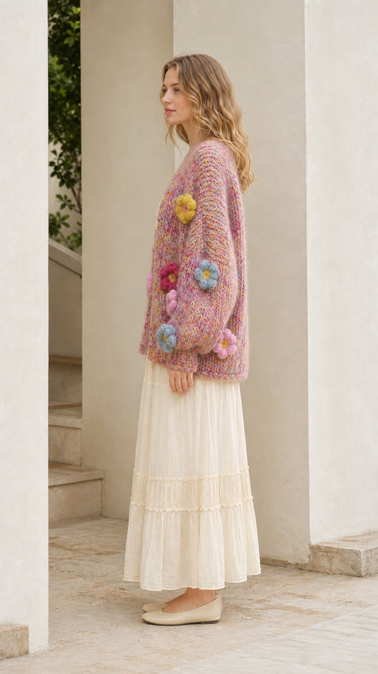 Model wearing pink floral cardigan from the side profile