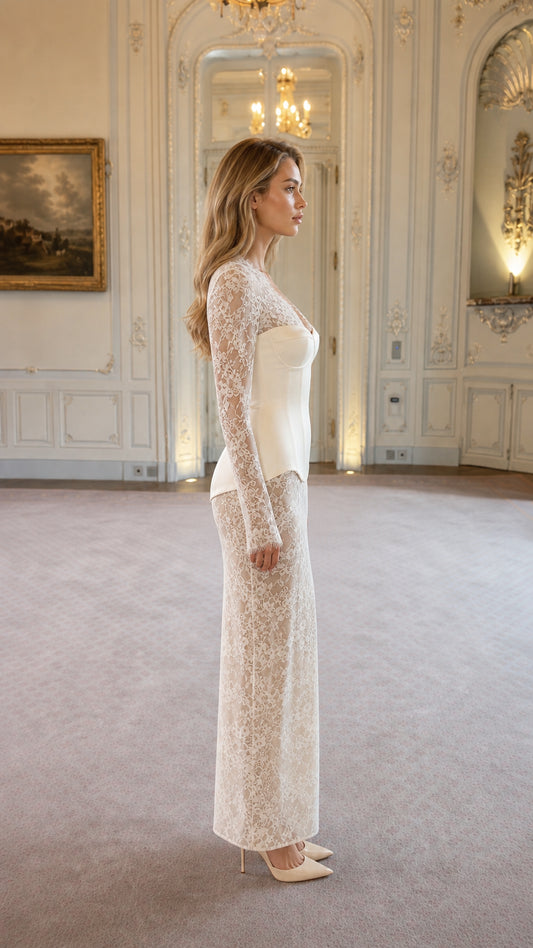 Side profile view of white lace corset maxi dress
