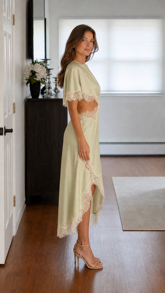 Side profile view of sage satin midi dress