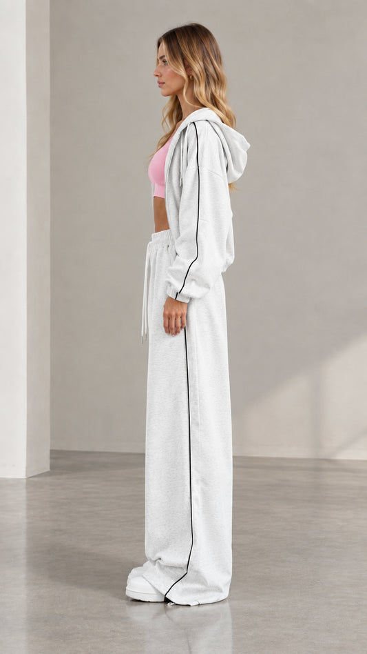 Side view of Heather Grey two-piece tracksuit set showing side stripe piping