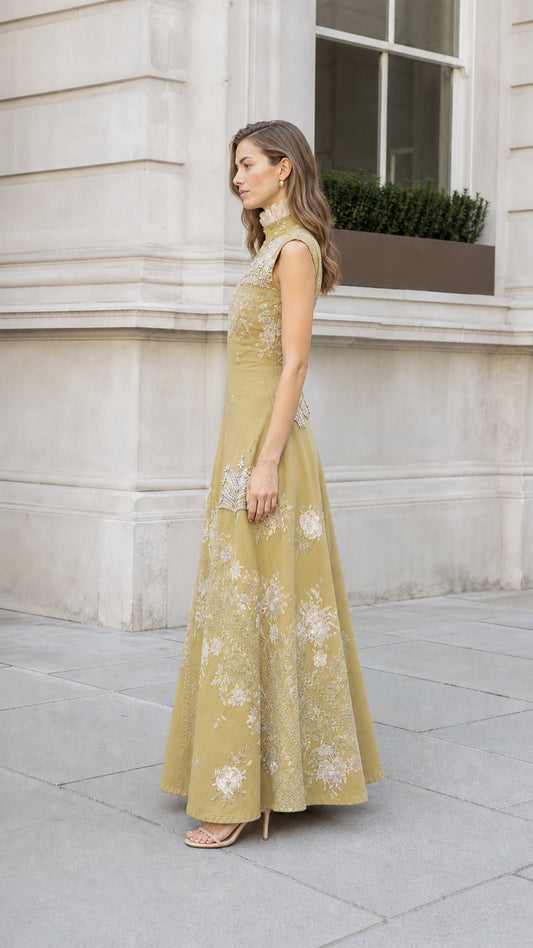 Side profile of olive embroidered maxi dress