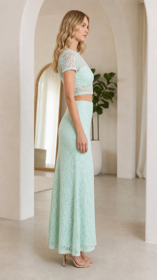 Side view of mint lace matching set on model wearing heels
