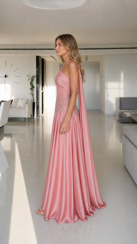 Model wearing pink satin maxi dress side view