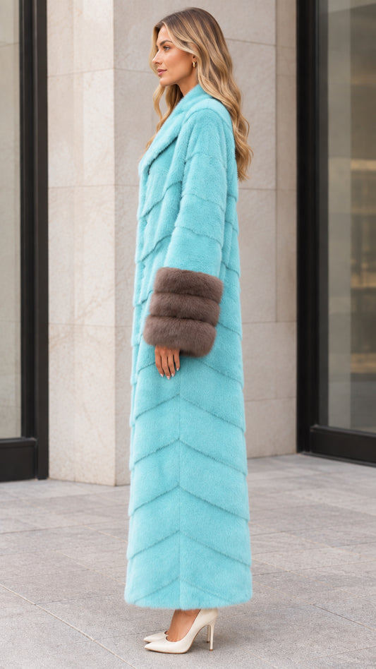 Side profile view of aqua blue long chevron faux fur coat with plush cuffs