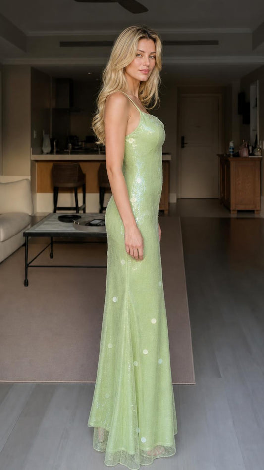 Side profile view of sage green sequin maxi dress
