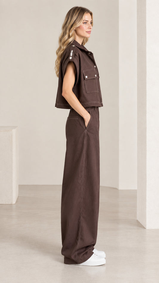 Side profile of woman in chocolate brown matching two-piece pant set