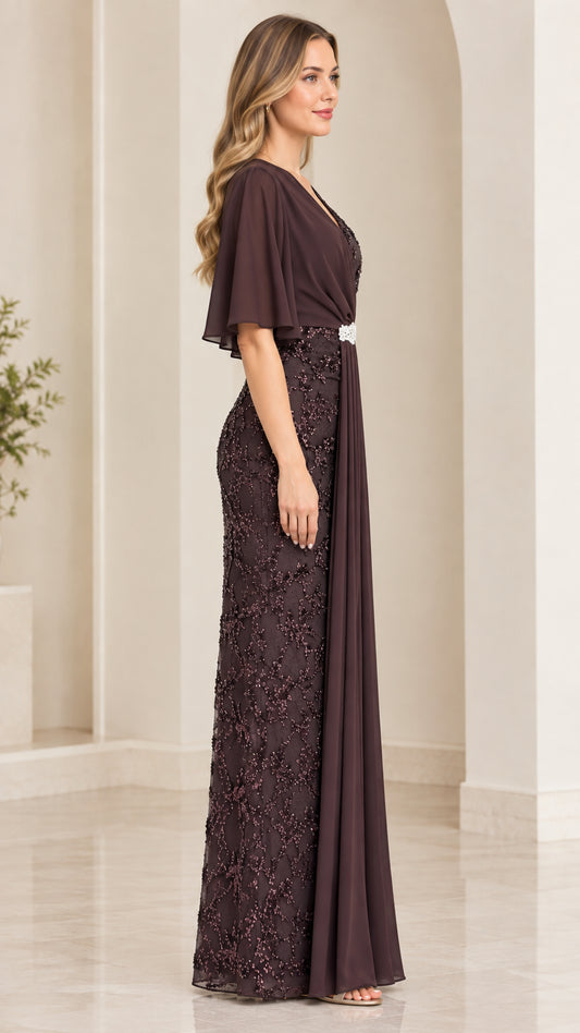 Side profile view of dark plum formal gown showing draped chiffon silhouette