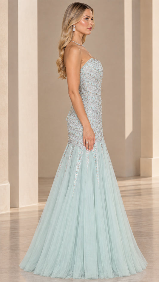 Side profile view of mint green strapless embellished mermaid evening gown