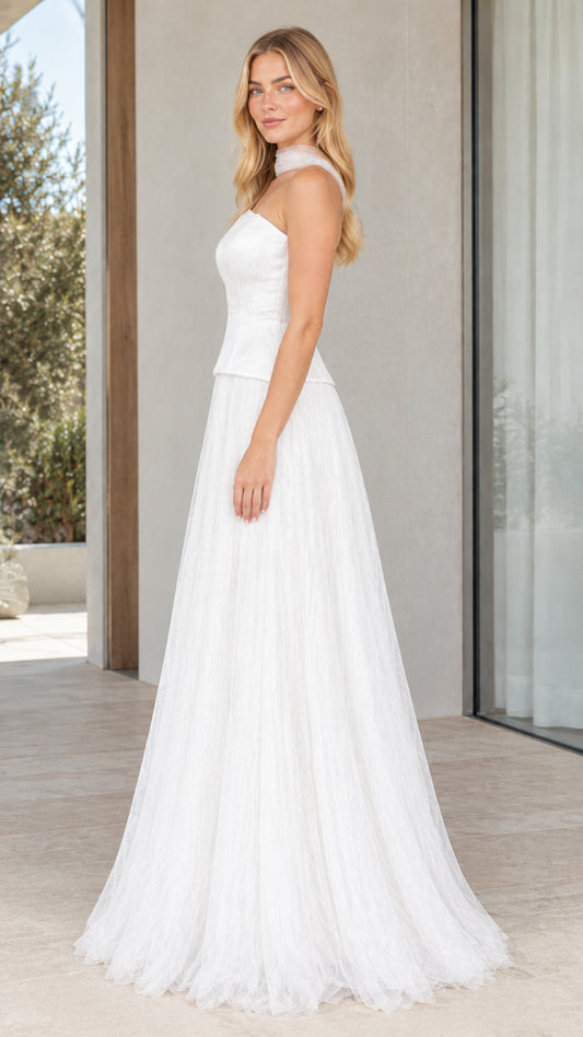 Side profile of white strapless corset tulle formal dress