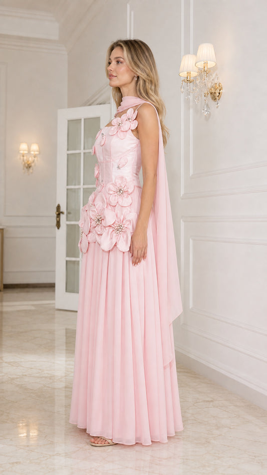 Side profile view of pink evening gown with matching stole
