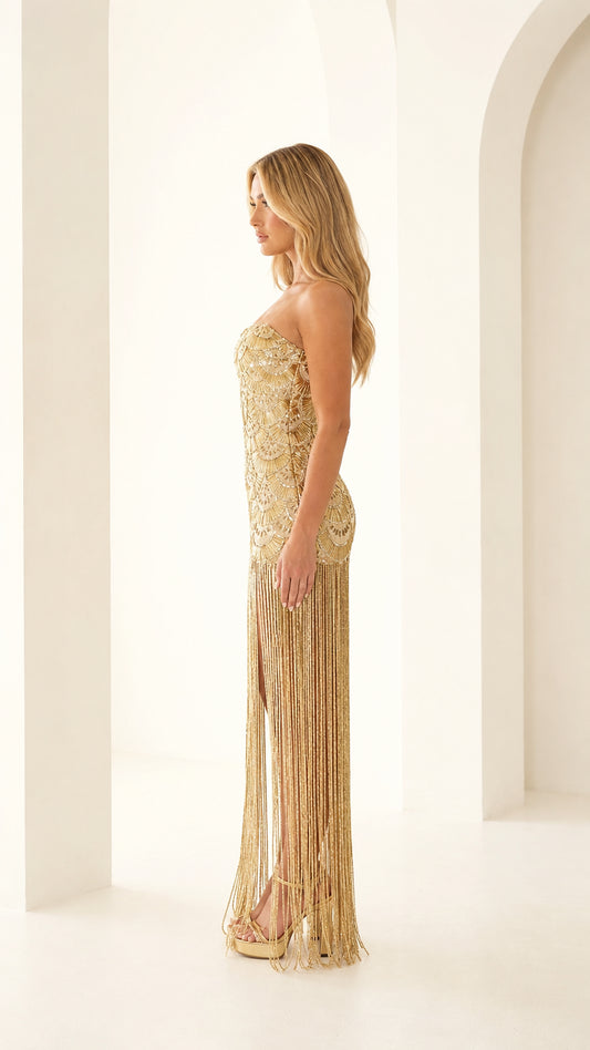 Side view of gold beaded fringe evening dress
