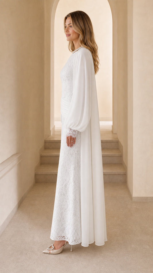 Side profile of woman in white lace gown
