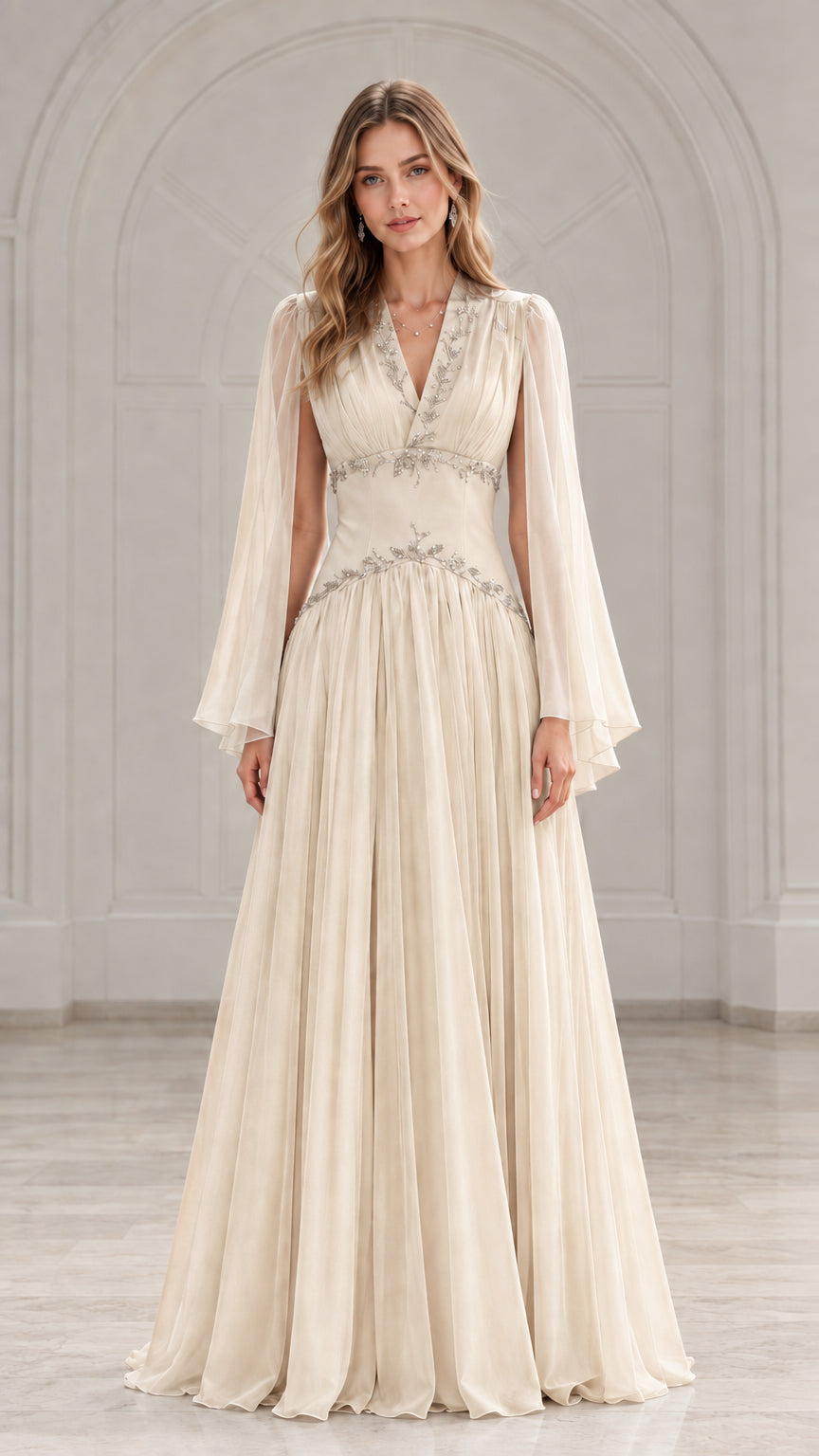 Front view of model wearing a champagne off-white beaded cape sleeve chiffon maxi gown