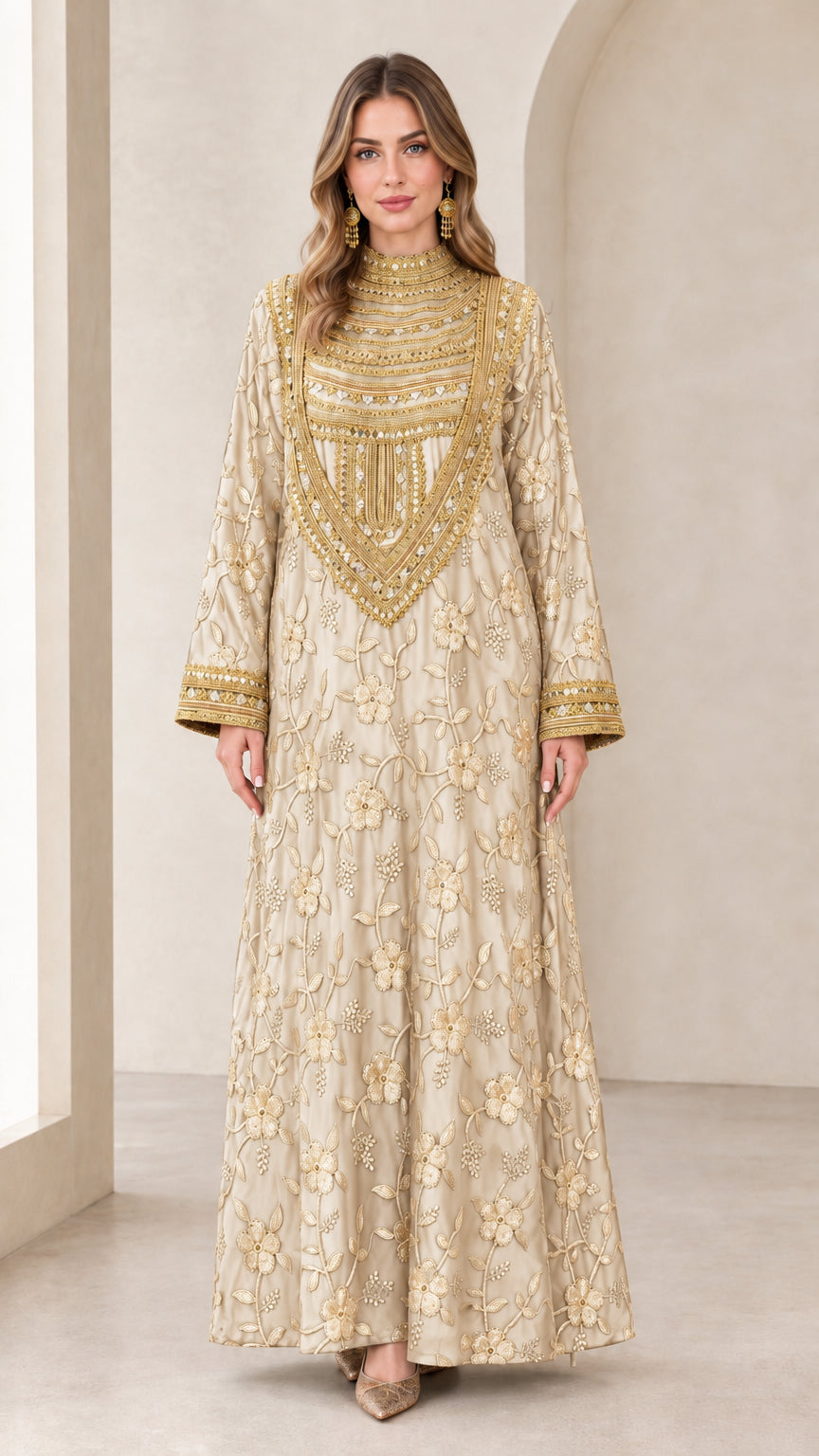 Front full view of champagne beige embroidered kaftan dress with gold accents