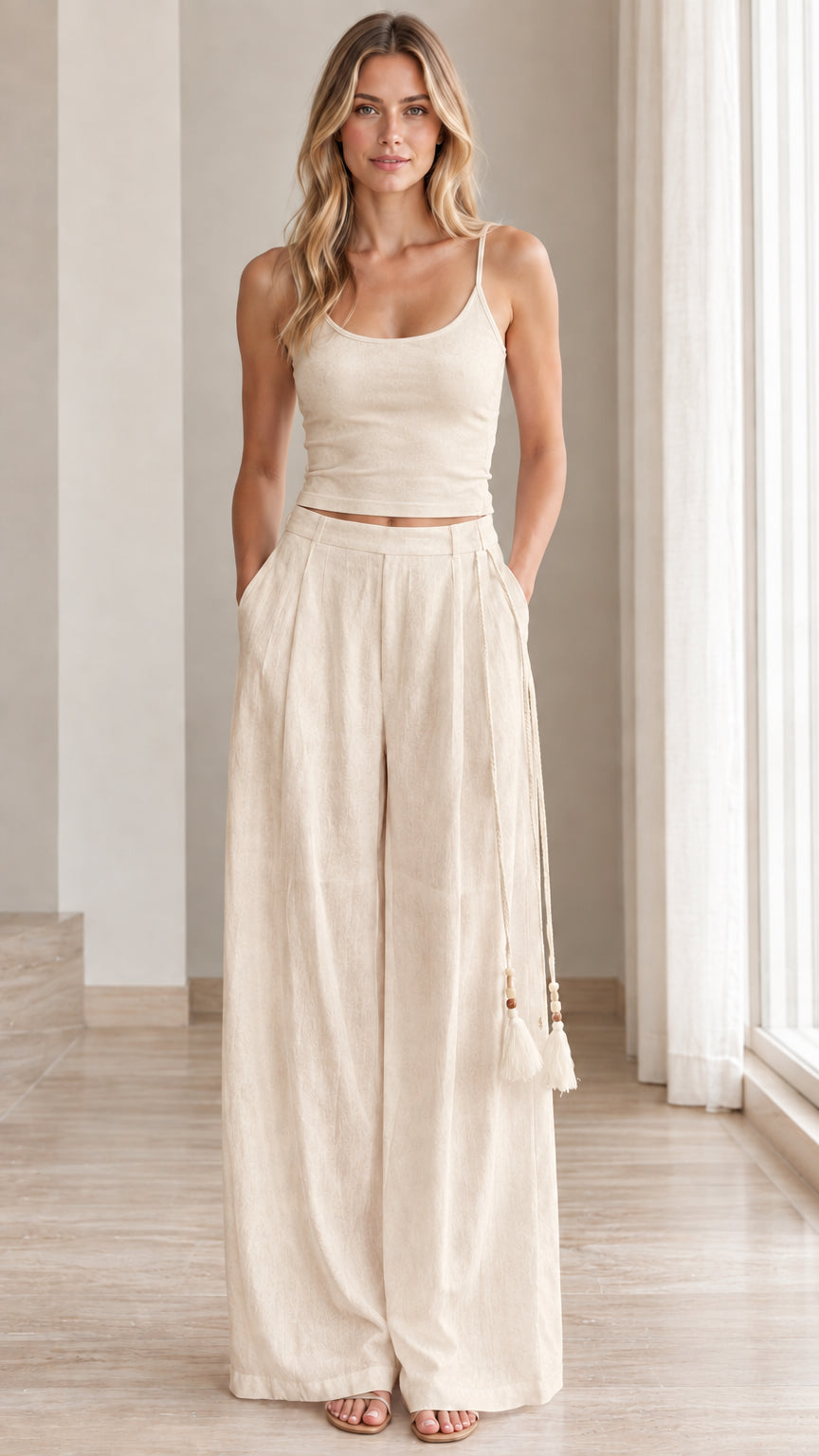 Front view of model wearing beige neutral tone two-piece matching set