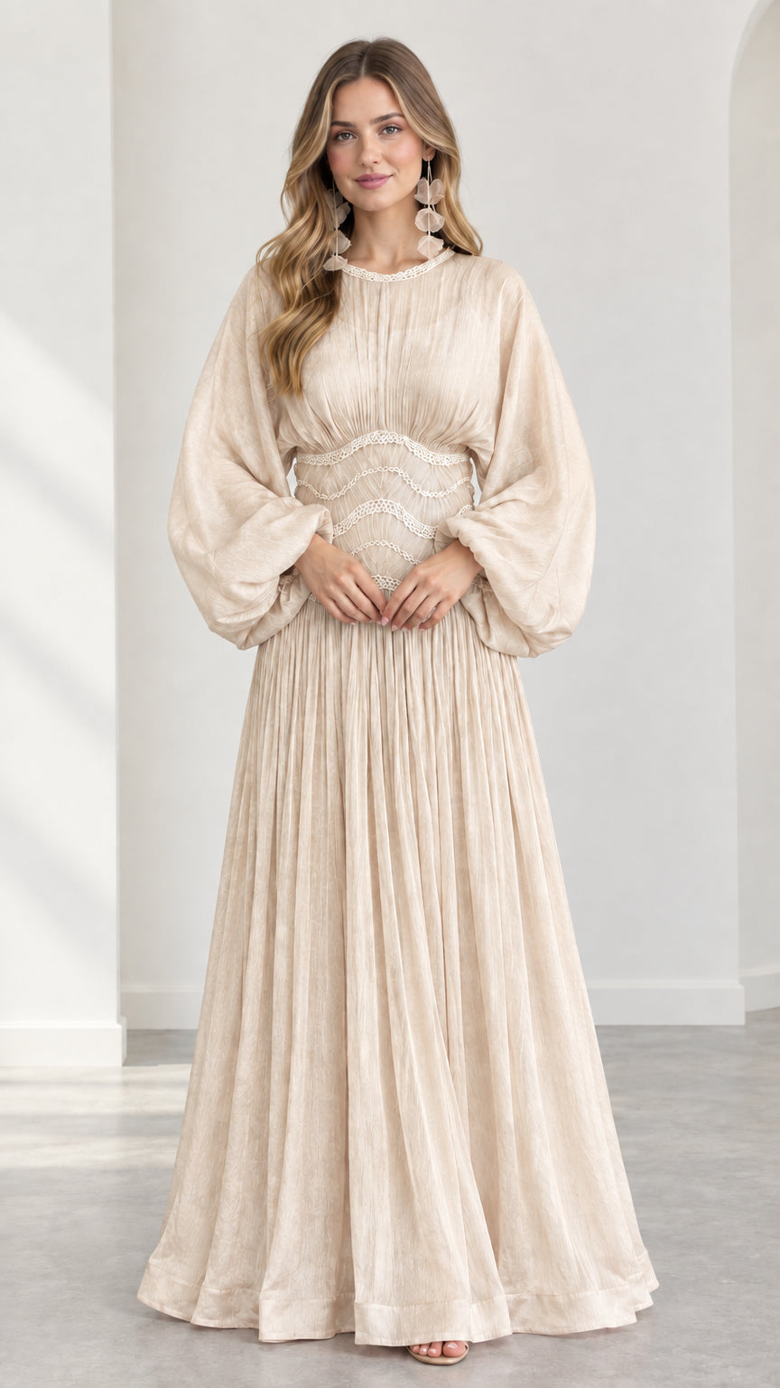 Model wearing champagne cream pleated balloon sleeve maxi dress
