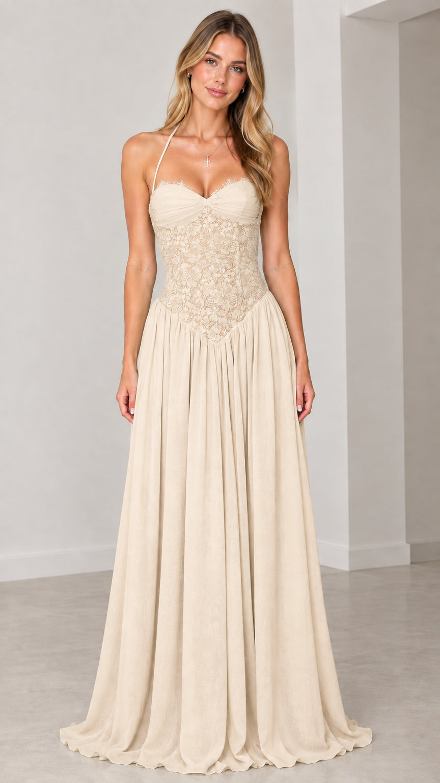 Front view of model wearing champagne beige halter maxi dress