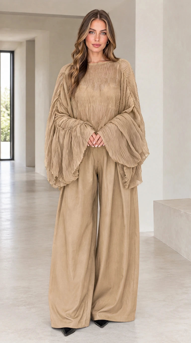 Front view of woman wearing khaki sheer pleated bell sleeve top and wide-leg pants set