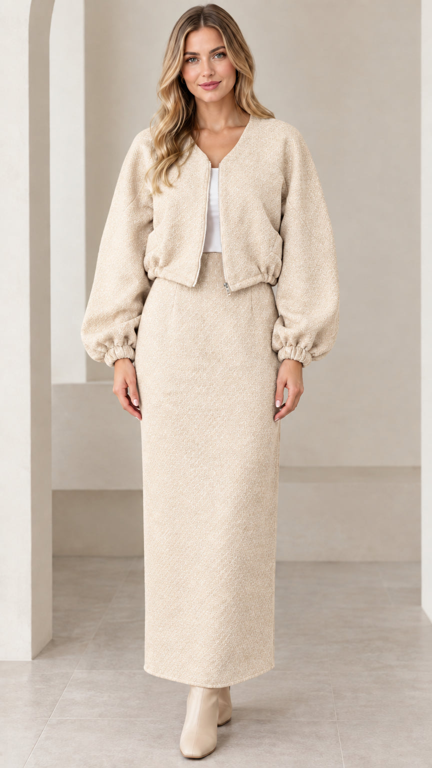 Full-length front view of beige textured cropped jacket and maxi skirt set