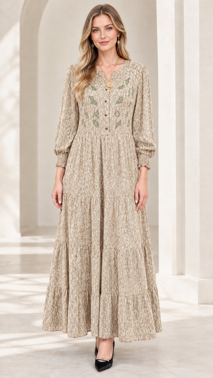 Front view of model wearing beige neutral tone tiered jacquard maxi dress