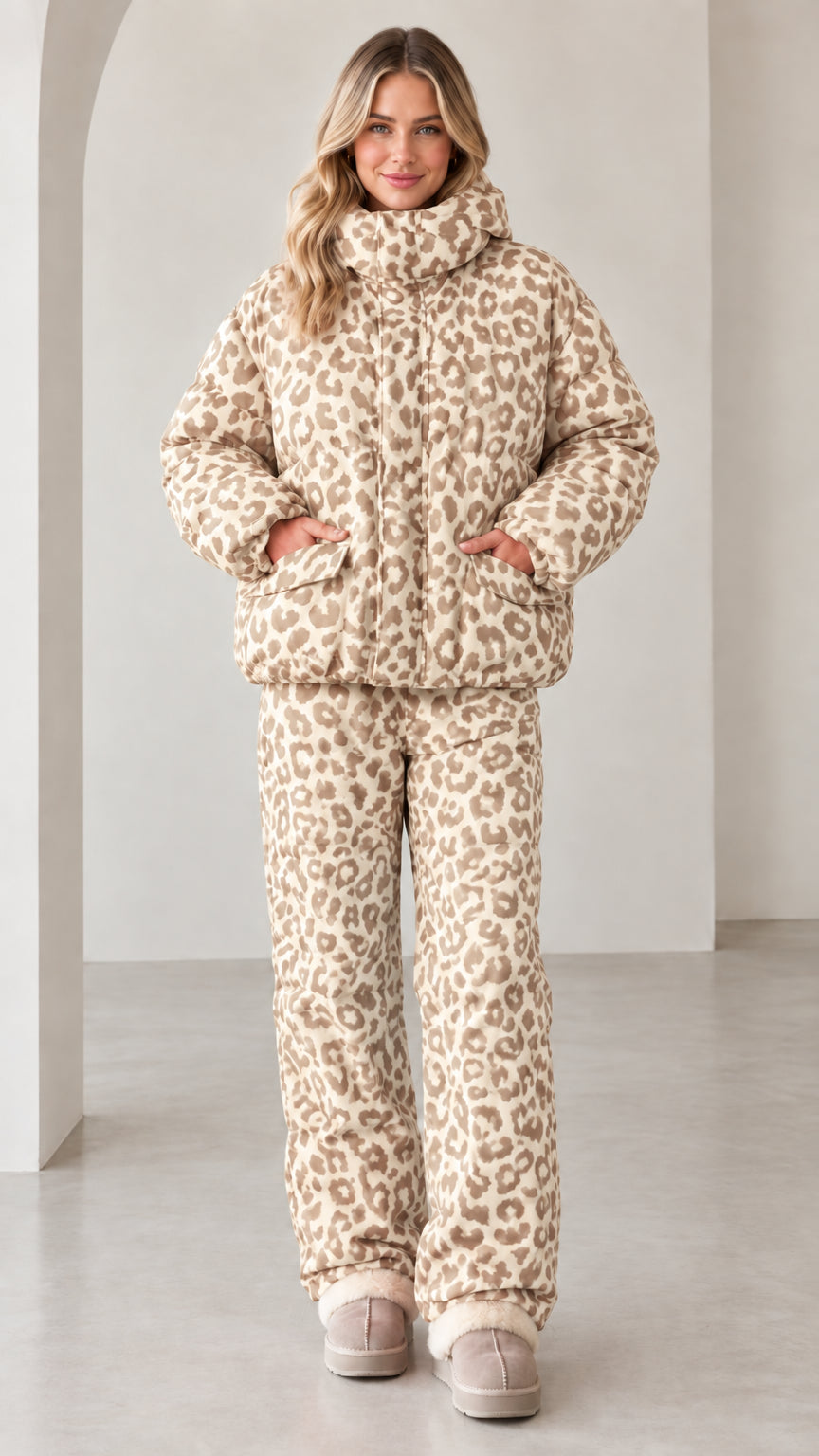 Full front view of model wearing beige and cream leopard print puffer set
