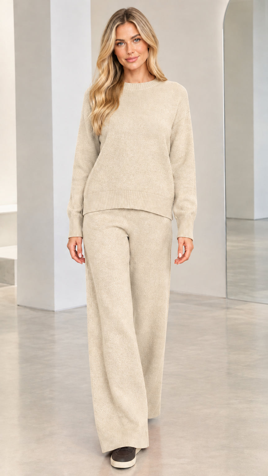 Model wearing oatmeal beige 2-piece knit sweater and wide-leg pants set