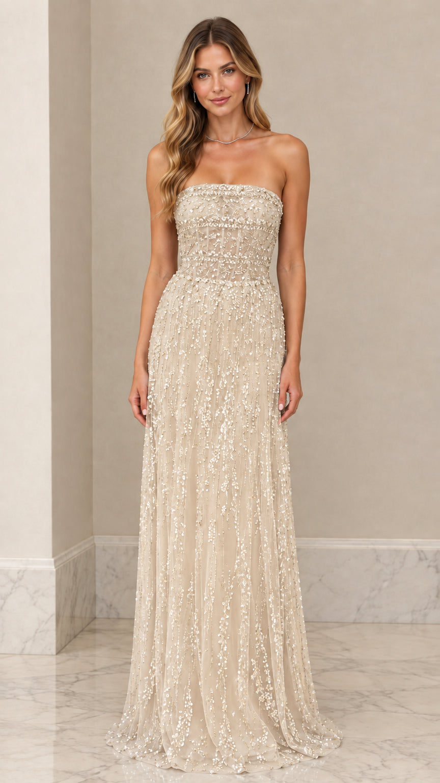 Front view of model wearing Champagne gold strapless beaded evening dress