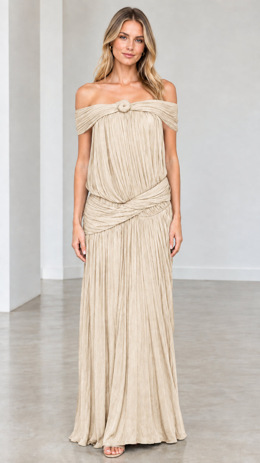 Full-length front view of model wearing Champagne pleated maxi dress