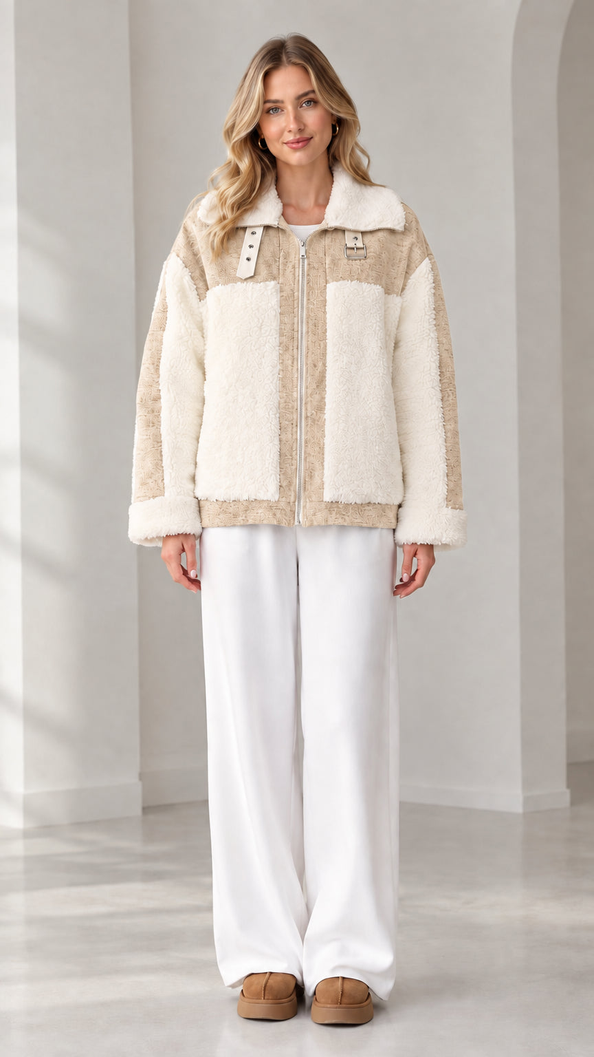Front view of woman wearing beige tan and cream colorblock sherpa fleece zip jacket