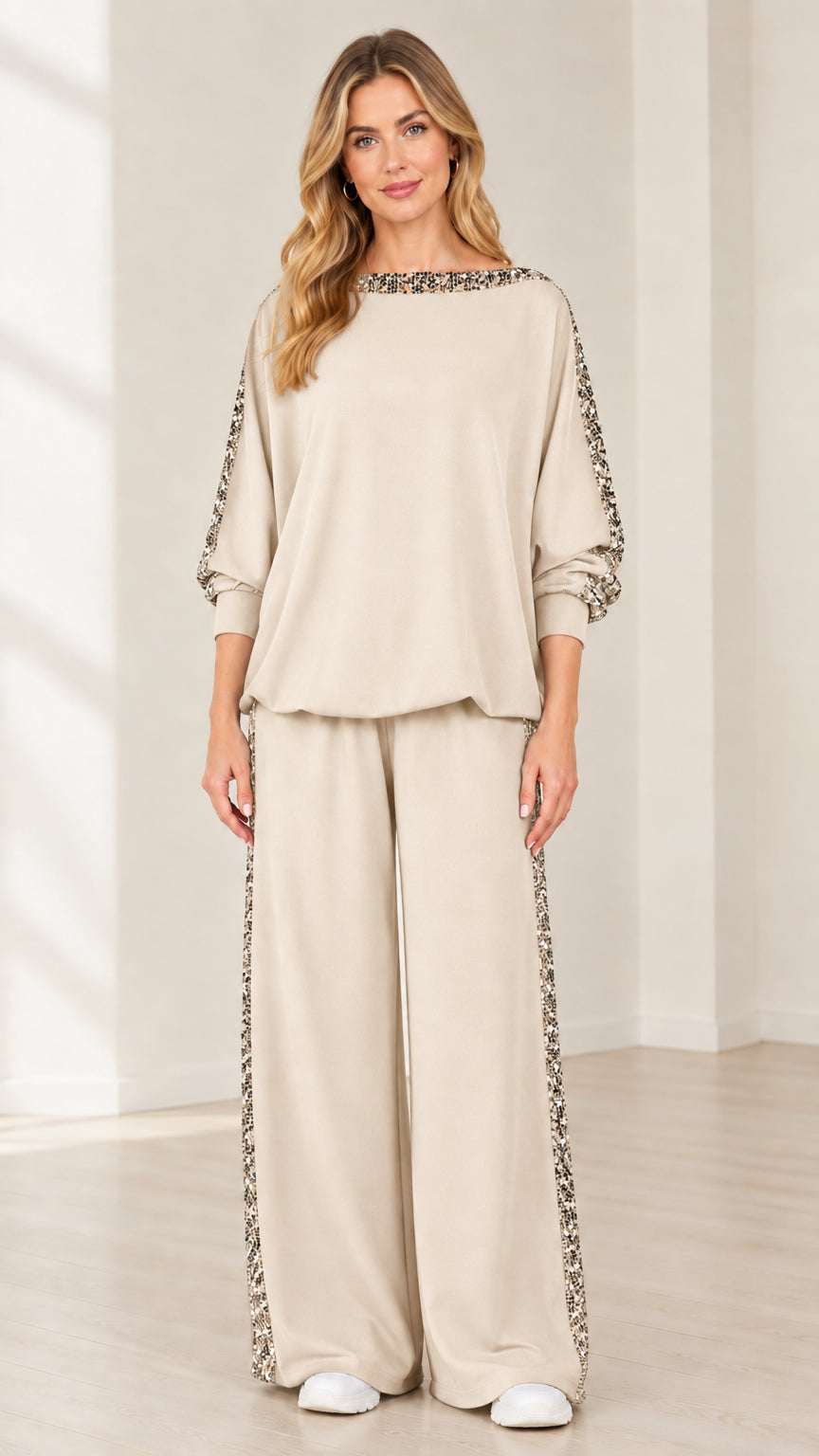 Woman wearing beige oatmeal 2-piece sequin embellished lounge set