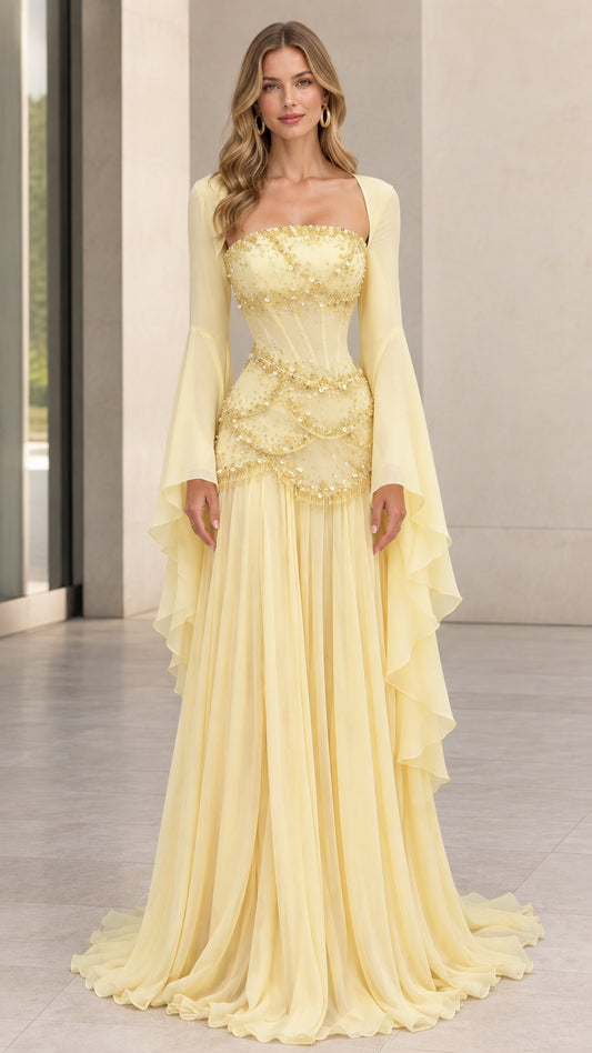 Front view of pastel yellow square neck beaded corset evening gown with dramatic bell sleeves