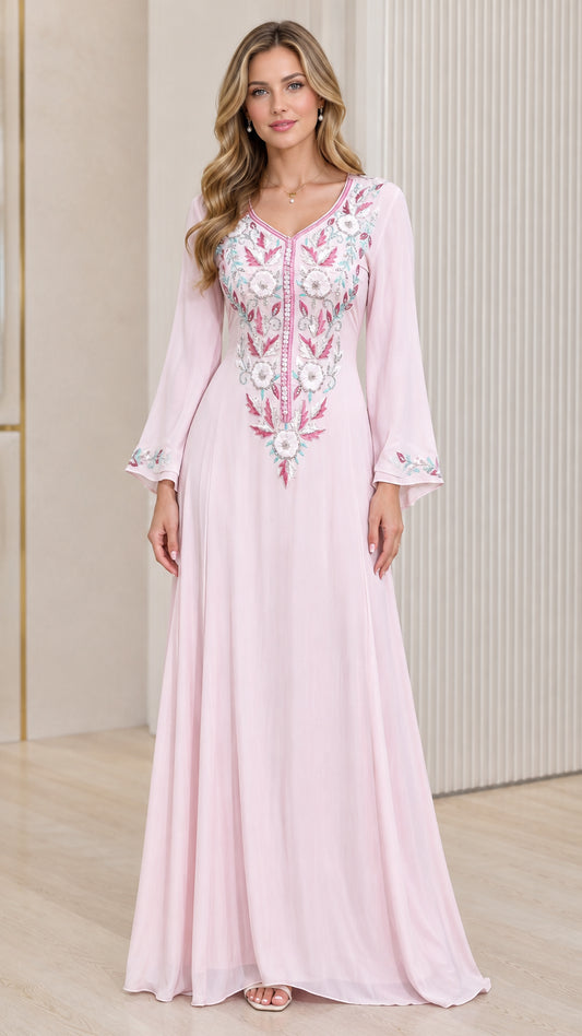Front full view of woman wearing Light Pink embroidered bell sleeve maxi kaftan dress