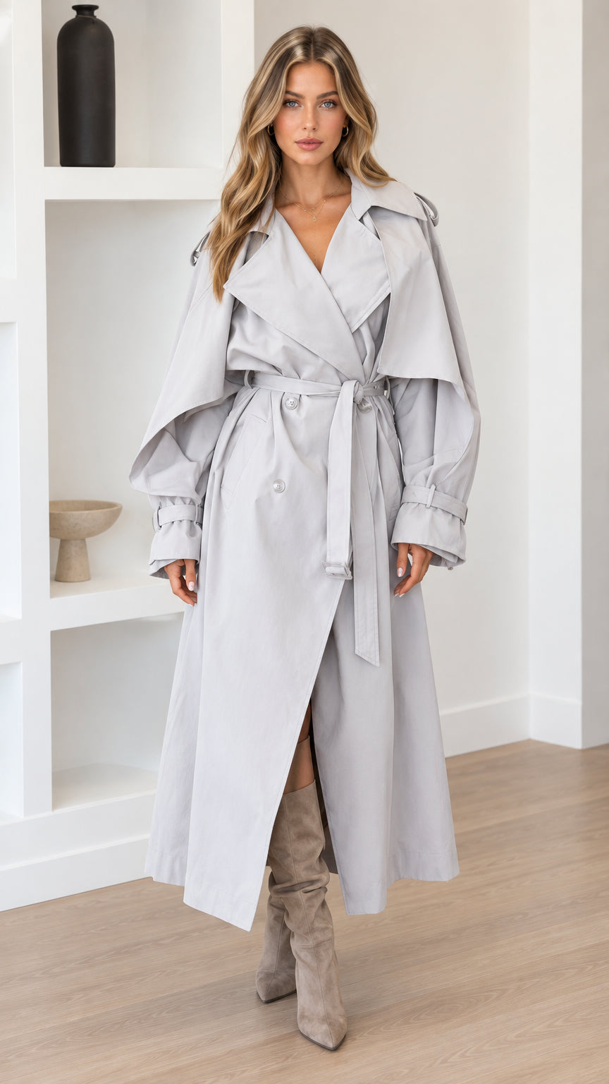 Front view of woman wearing Light Grey oversized maxi belted trench coat