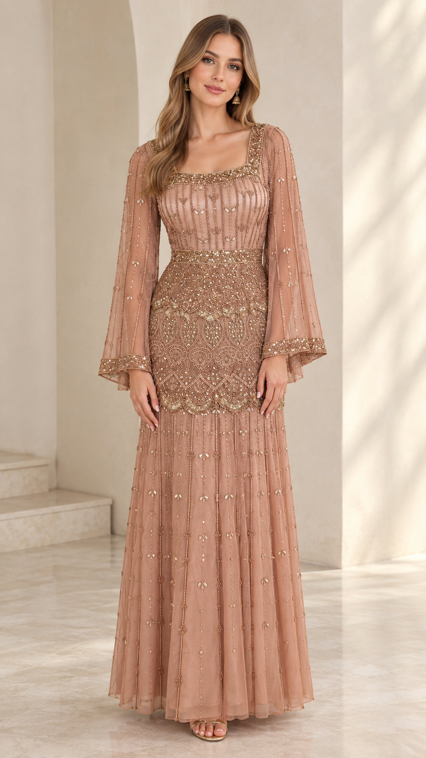 Front view of model wearing dusty rose square neck beaded evening gown with bell sleeves