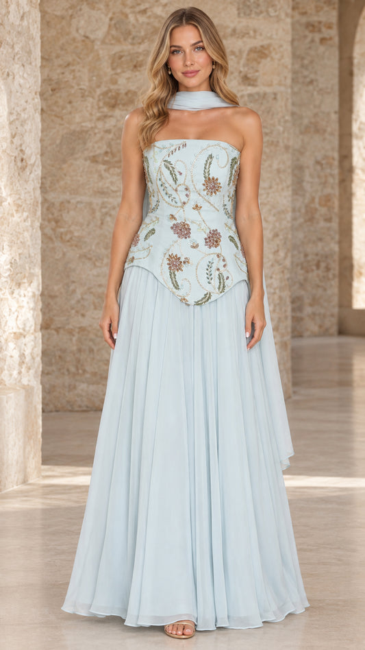 Front full view of sky blue strapless chiffon evening gown with embroidered bodice and neck scarf