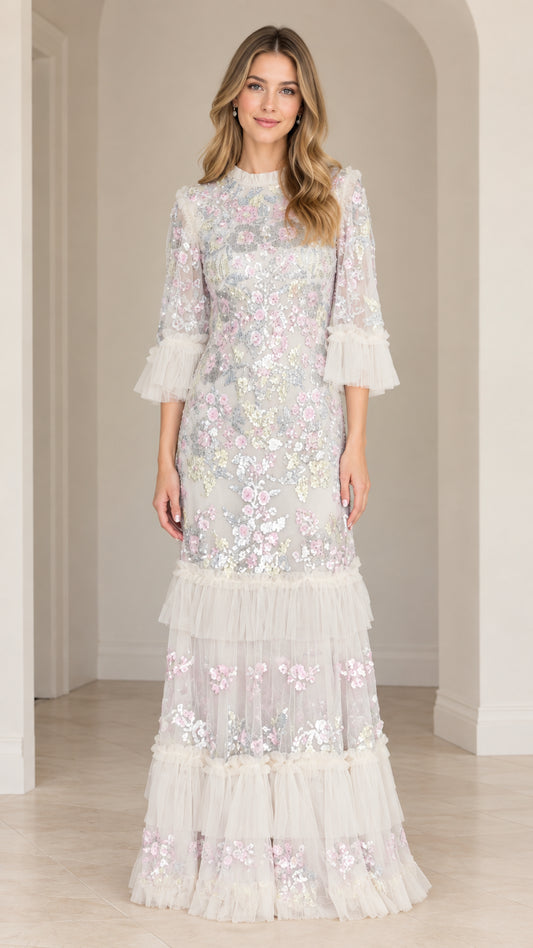 Front view of Ivory White floral sequin embroidered tiered maxi evening gown