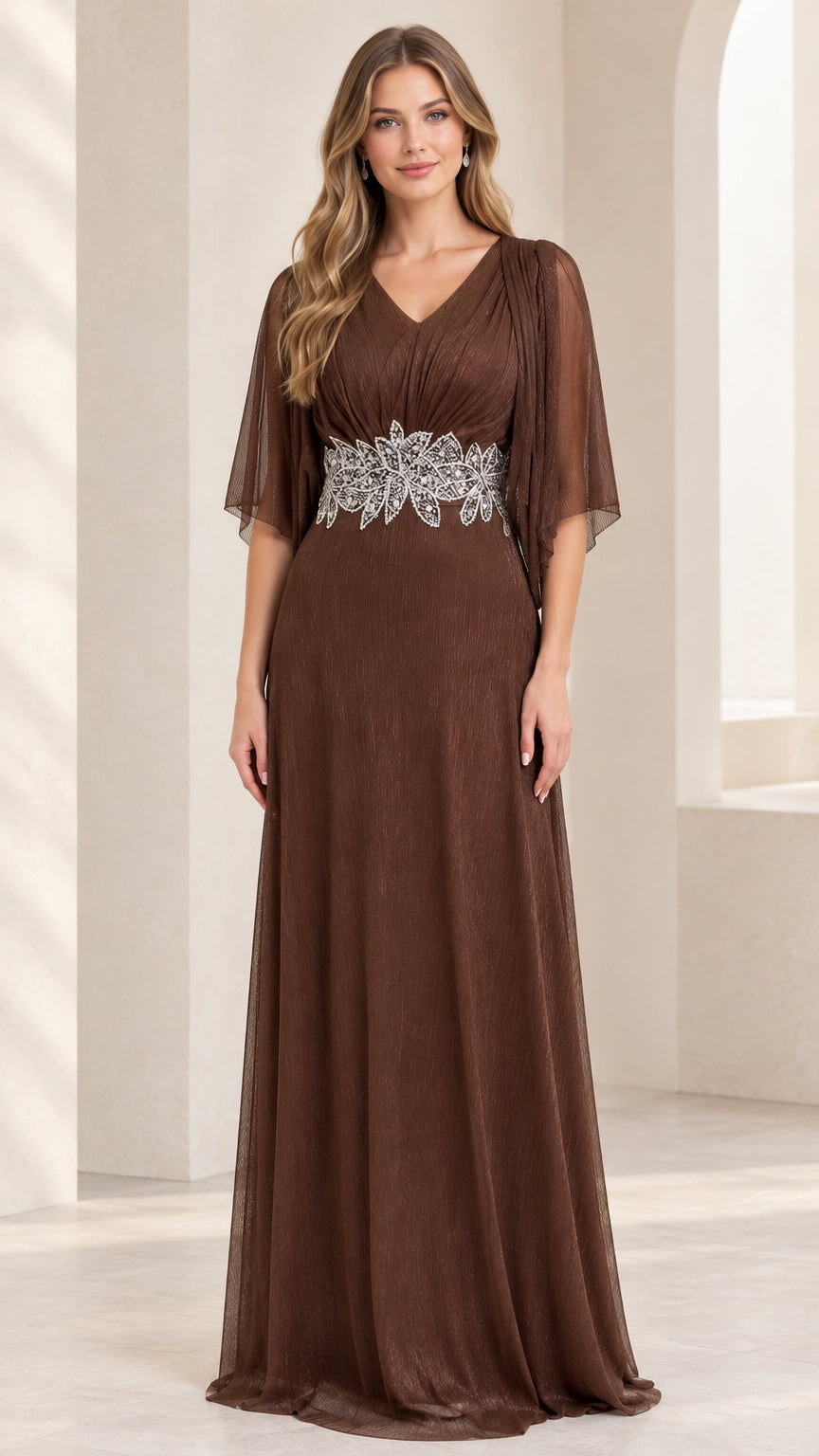 Front view of model wearing chocolate brown V-neck flutter sleeve maxi evening gown with embellished waist
