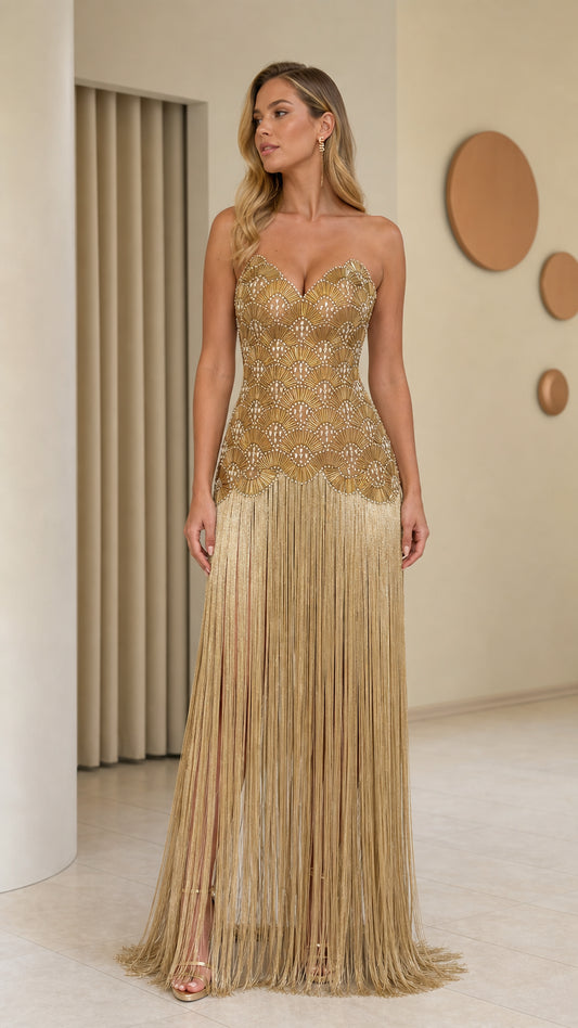 Model wearing gold beaded sweetheart fringe evening gown front view