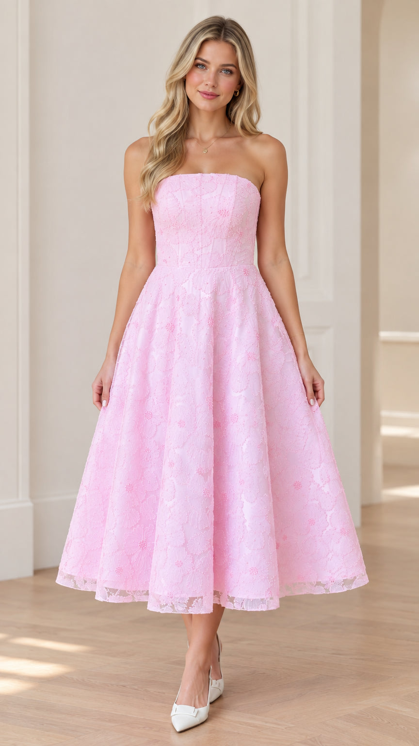 Front view of woman wearing strapless pink floral lace A-line midi dress