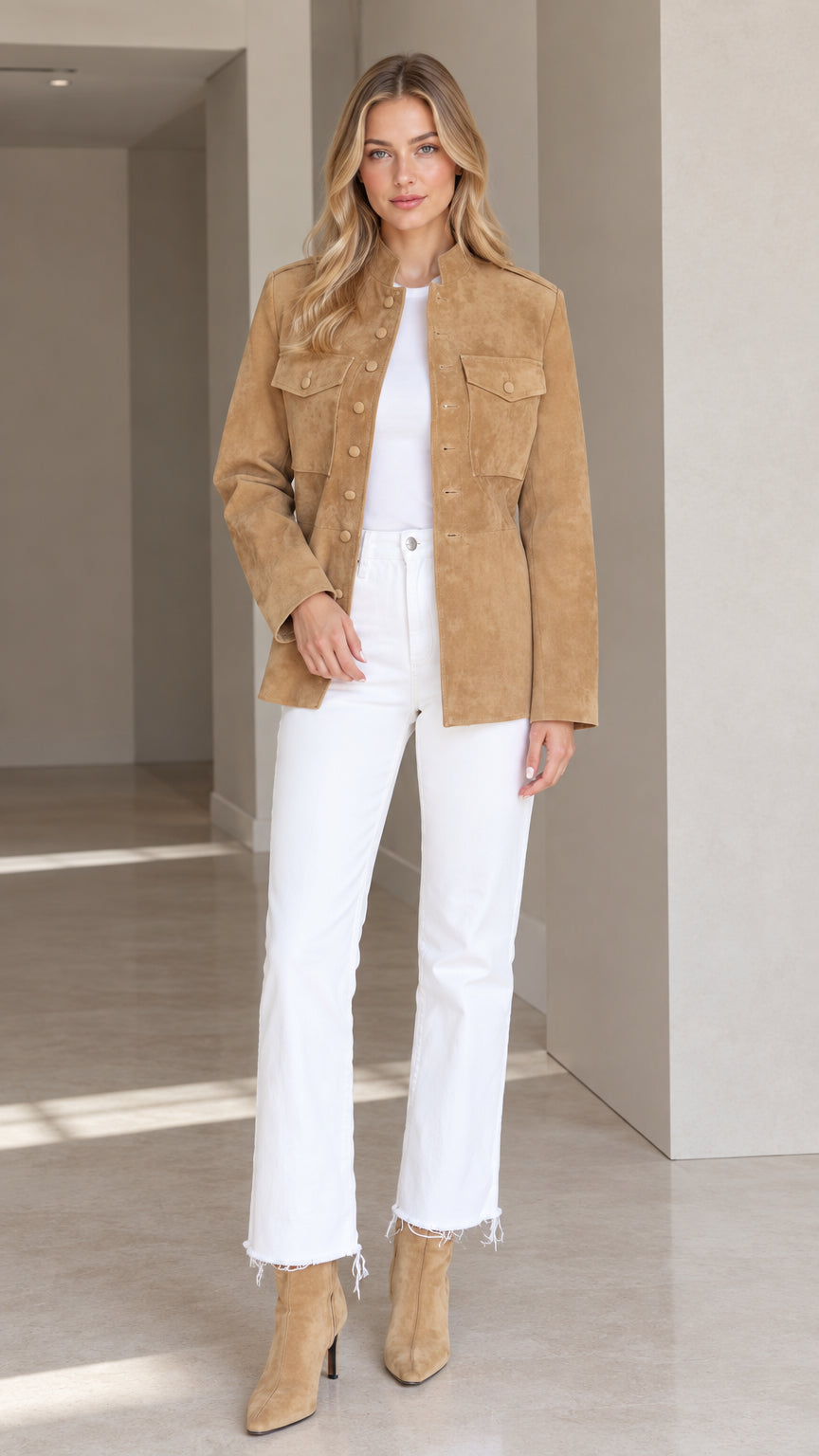 Front full view of woman wearing Camel faux suede utility jacket with white jeans