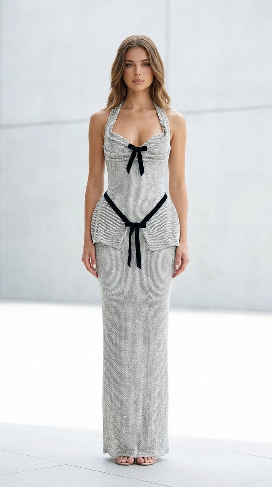 Front view of silver glitter halter maxi dress with velvet bows