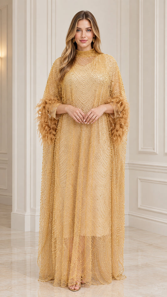 Front view of model wearing Champagne Gold beaded kaftan maxi dress with feather cuffs