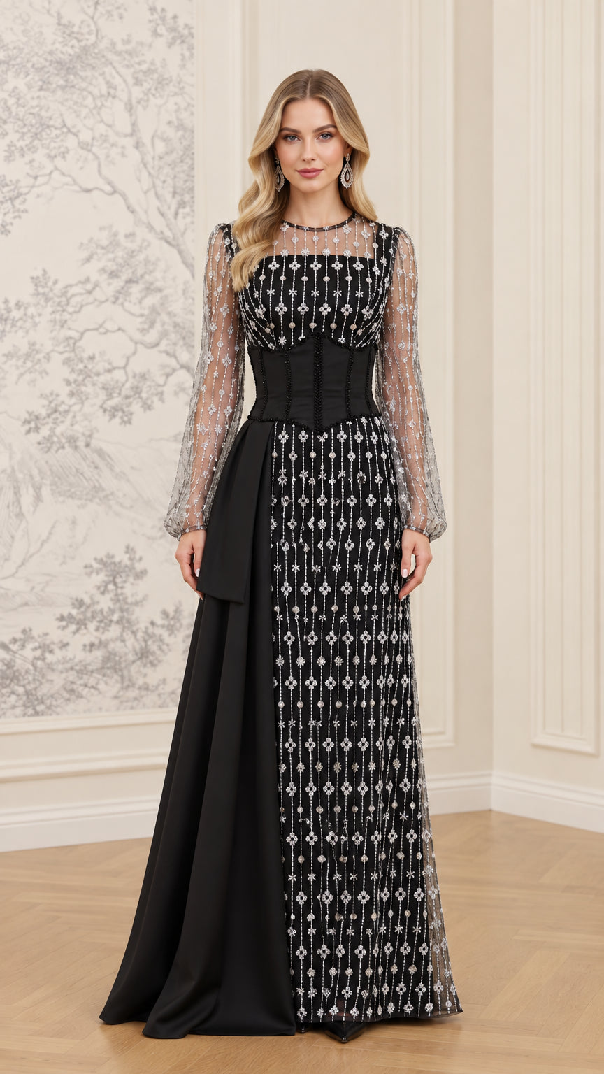 Front full view of black rhinestone embellished long sleeve evening gown with corset waist and side drape