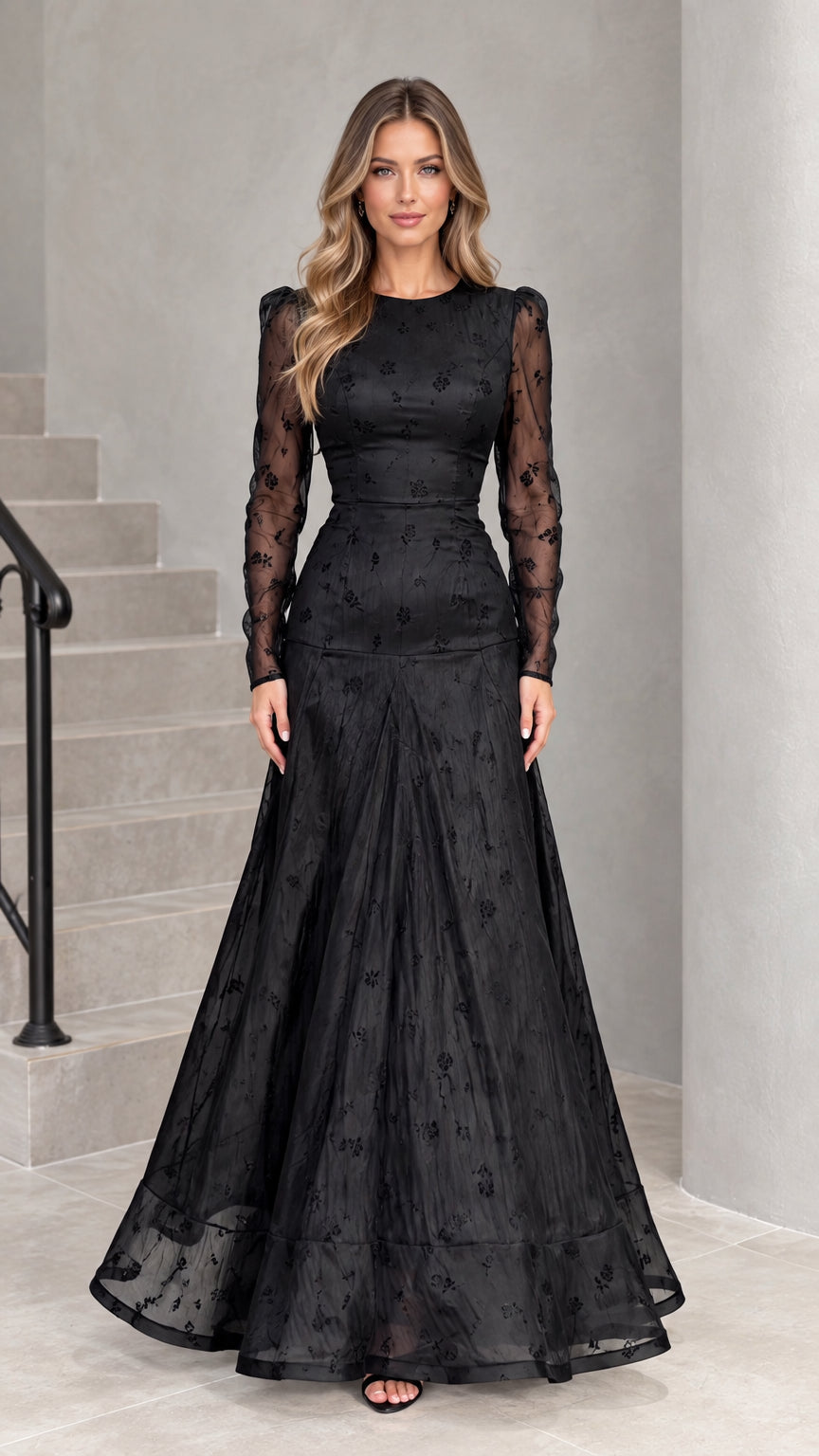 Front view of black floral embroidered long sleeve maxi evening gown