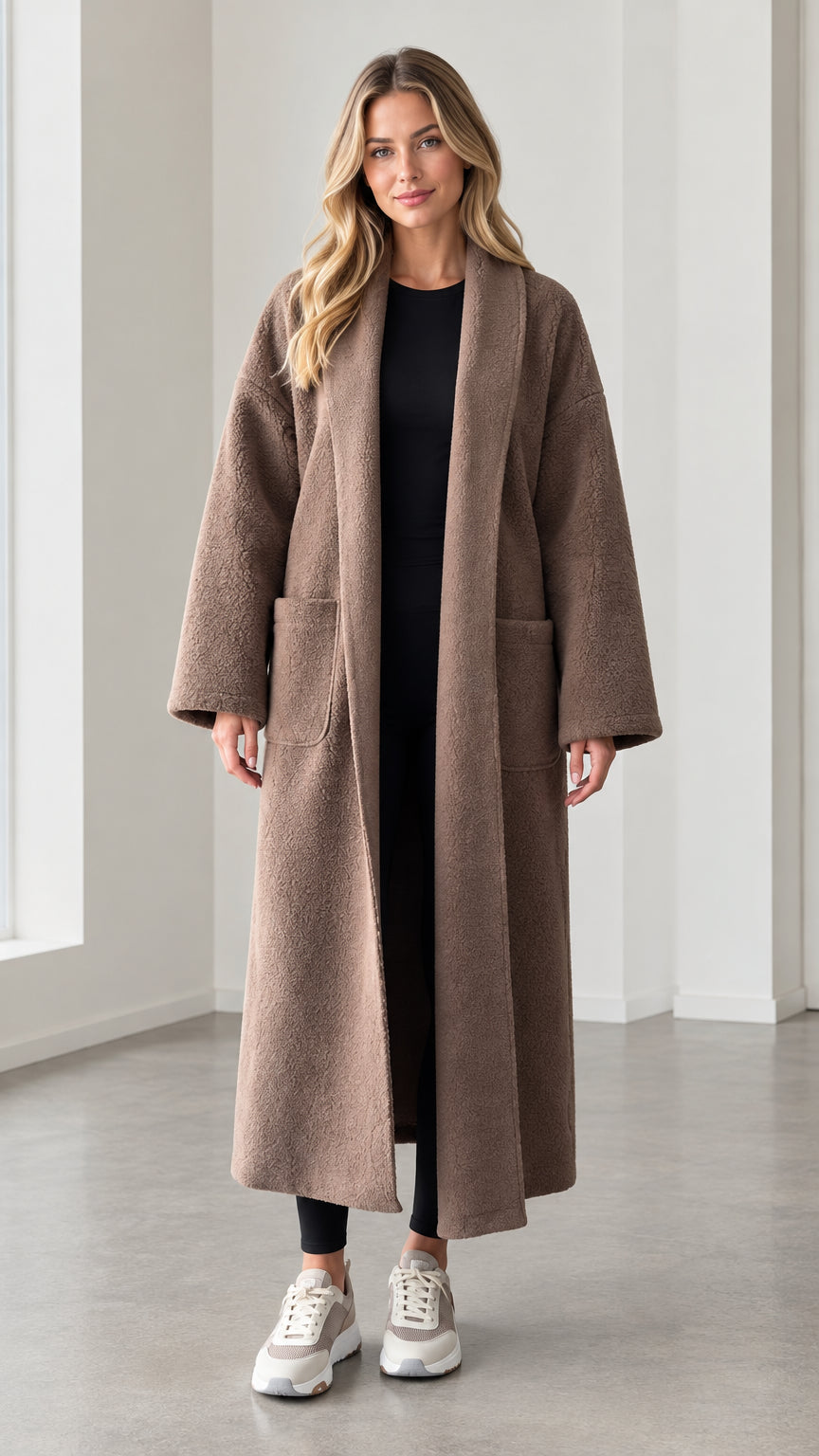 Front view of model wearing mocha textured longline open front duster coat