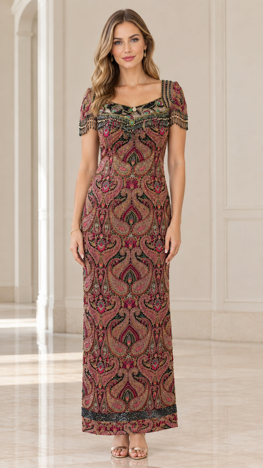 Front view of model wearing burgundy paisley beaded maxi evening gown with fringe sleeves